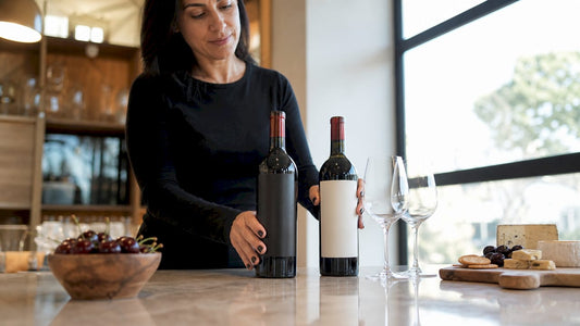 Woman arranging premium and everyday wine bottles